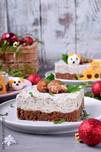 Wallpaper Mural Salty cheesecake garnished with roasted champignons. New Year 2020 appetizer with mice of quail eggs, symbol of the new year Torontodigital.ca