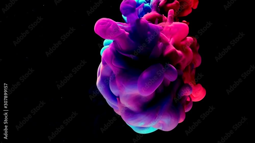 Beautiful red-blue-violet space abstract background. Stylish modern background. Cool trending screensaver. Watercolor ink in water on a black background. A powerful explosion of colors. Beautiful red-blue-violet space abstract background. Stylish modern background. Cool trending screensaver. Watercolor ink in water on a black background. A powerful explosion of colors.