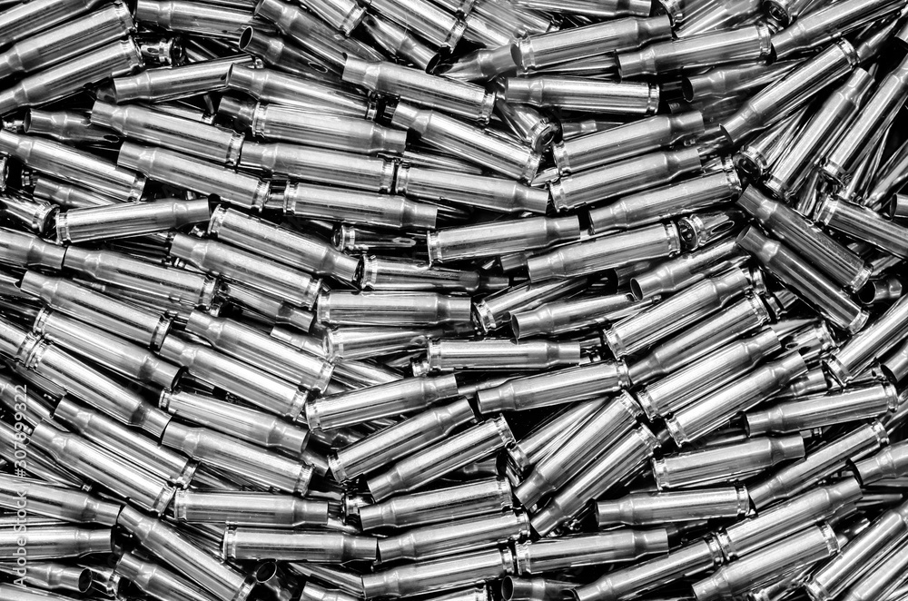 Many ammunition cartridge case background. Many ammunition cartridge case background.