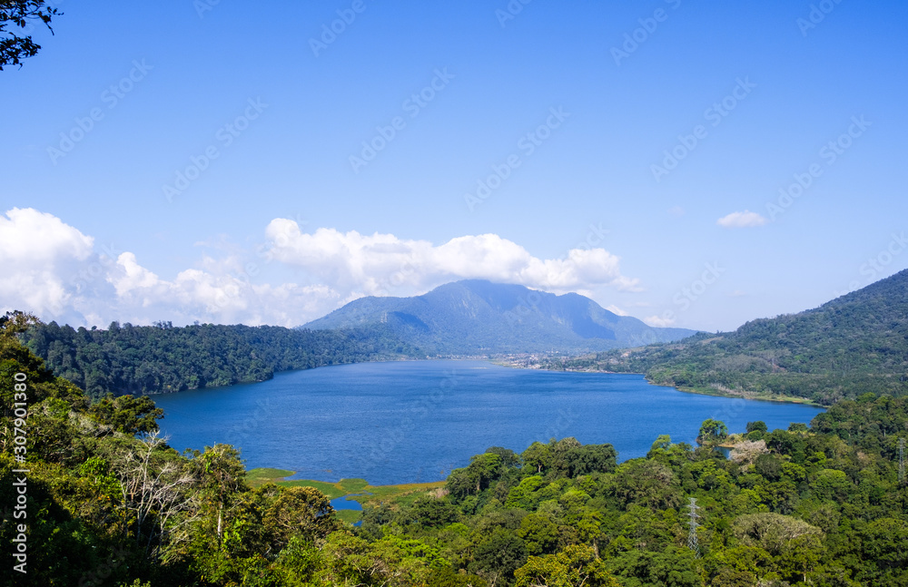 View of lake Buyan (Danau Buyan) from the top. Landscape with lake and mountain views. Bedugul, Buleleng, Bali, Indonesia.