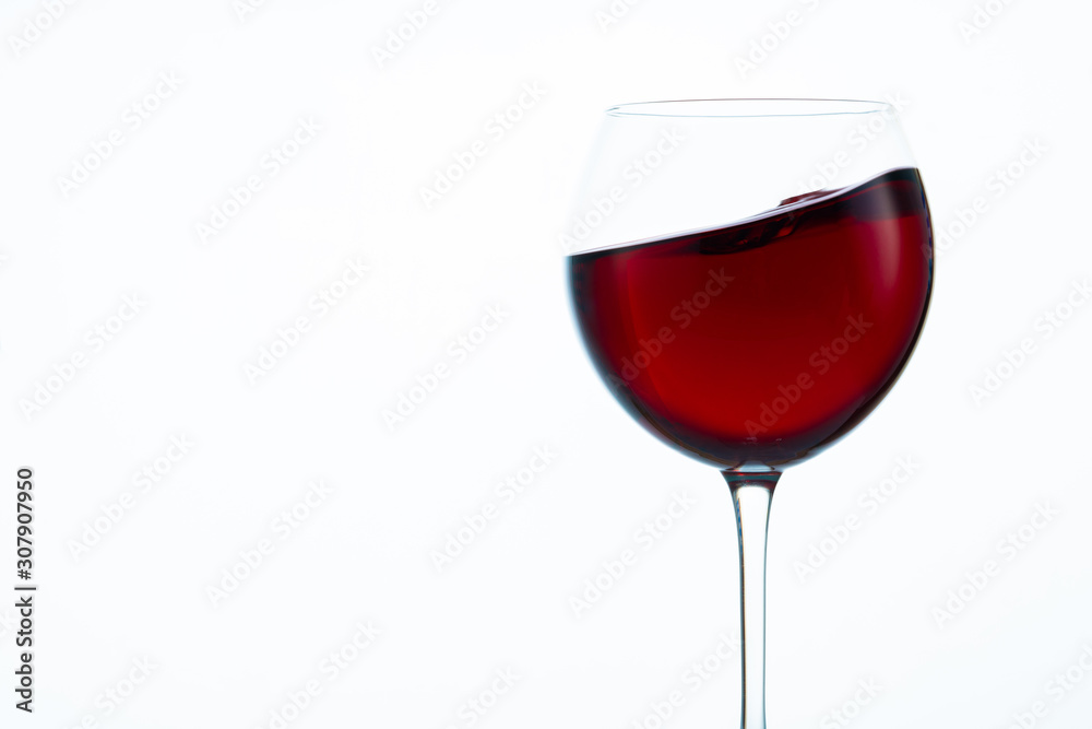 glass of red wine on white background glass of red wine on white background