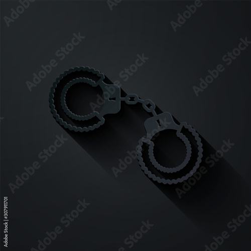 Paper cut Sexy fluffy handcuffs icon isolated on black background. Handcuffs with fur. Fetish accessory. Sex shop stuff for sadist and masochist. Paper art style. Vector Illustration