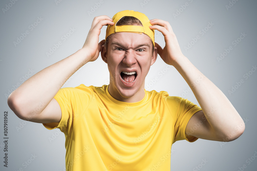 Stressful teenager screaming with panic Stressful teenager screaming with panic