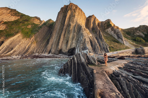 Coast landscape of famous Flysch in Zumaia, Basque country, Spain. Famous geological formations landmark . photo