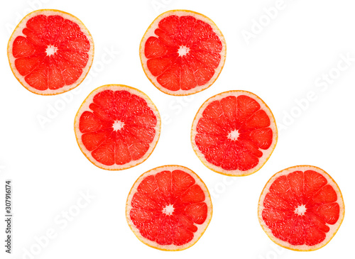  Grapefruit slices on a white background. Close-up.