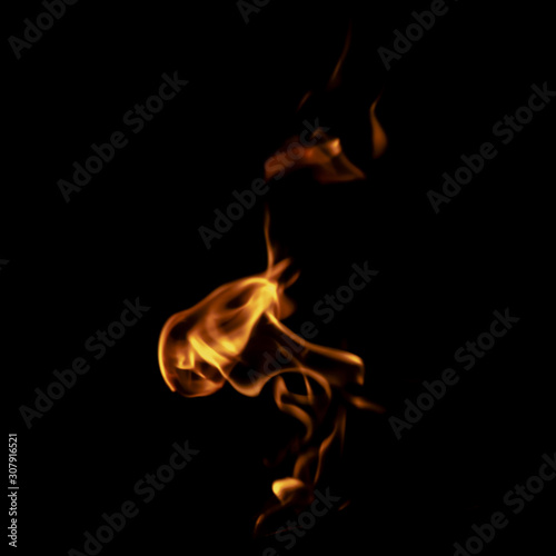 yellow fire on black background texture isolated © andRiU