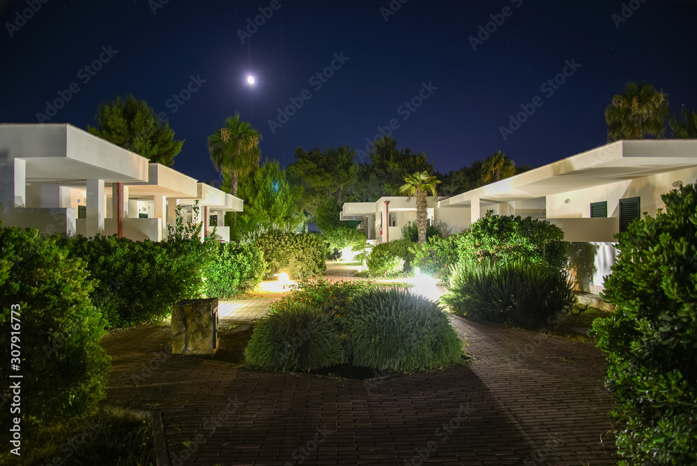 Night Modern Homes with Illuminated Path by Summer