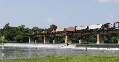 Train crossing bridge in Caledonia, Canada photo