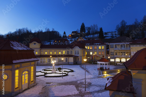 Snowy night Spa Libverda in north Bohemia, Czech Republic photo