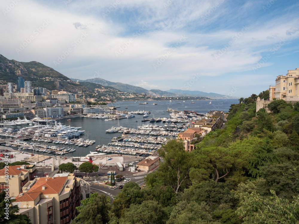 Monaco, july 2019: Panoramic view of port. Azur coast. Colorful bay with a lot of luxury yachts in sunny day