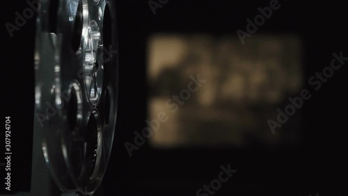 Video of film projector filming on black