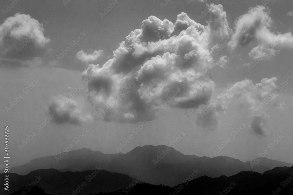 black and white clouds in the sky
