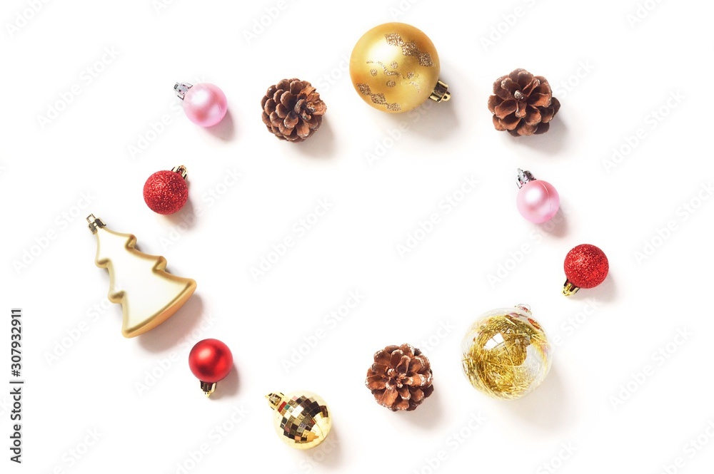 Christmas and New Year decoration. Red, pink, gold balls, pine cones on a white background. Xmas mockup, free space for text. Minimalist festive design Christmas and New Year decoration. Red, pink, gold balls, pine cones on a white background. Xmas mockup, free space for text. Minimalist festive design