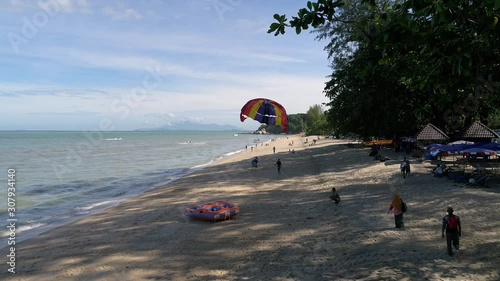 Batu Feringgi Penang, Malaysia. Parasailing activities near batu feringgi beach.