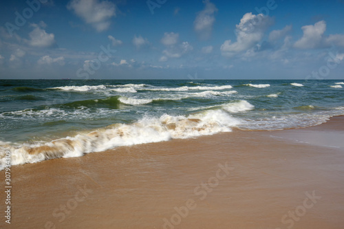 sea waves on sunny beach