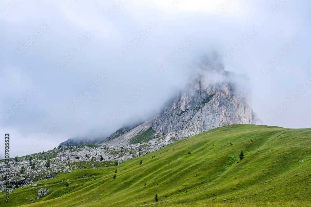 Foggy mountain landscape of the picturesque Dolomiti in Italy.