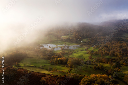 Beautiful vibrant aerial drone landscape image of sunrise in Autumn Fall over English countryside