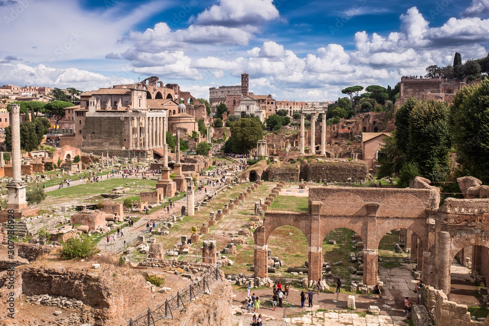 Panoramic view of the Roman Forum Foro Romano and Ruins of Septimius Severus Arch and Saturn Temple in Rome, Italy