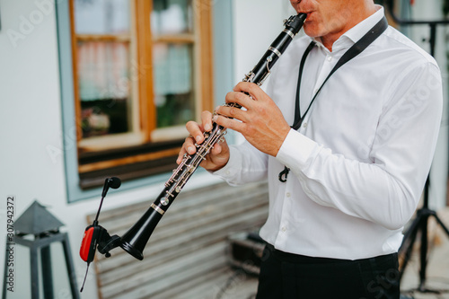 clarinet player at an event 