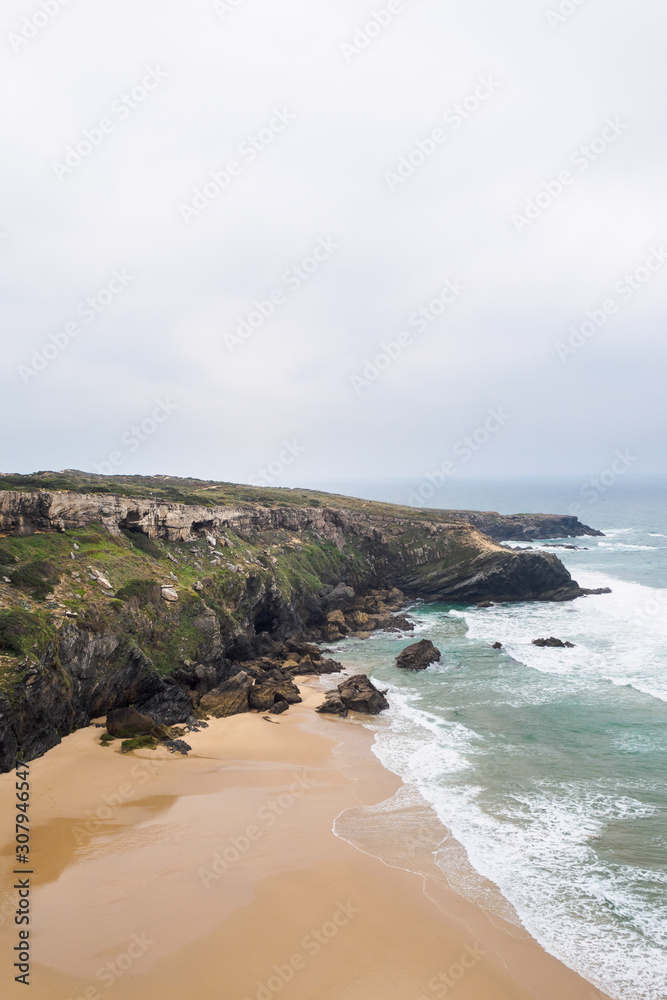 High angle view of the coastline with cliff and beach, Alentejo, Portugal High angle view of the coastline with cliff and beach, Alentejo, Portugal