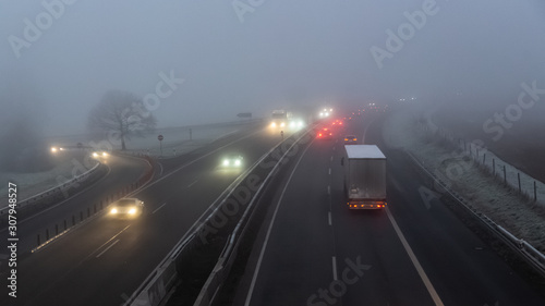 cars on foggy autobahn
