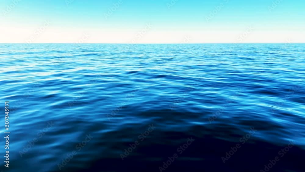No waves on the ocean. Quite ocean. No waves on the water. Calm water.