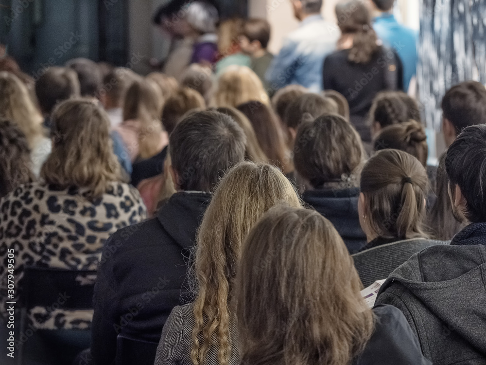 © sablinstanislav - People sitting back in the conference room. © sablinstanislav - People sitting back in the conference room.