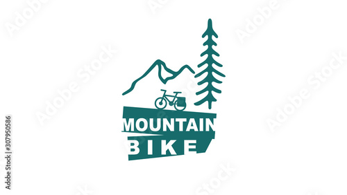 mountain bike logo. bicycles and pine trees in the mountains.