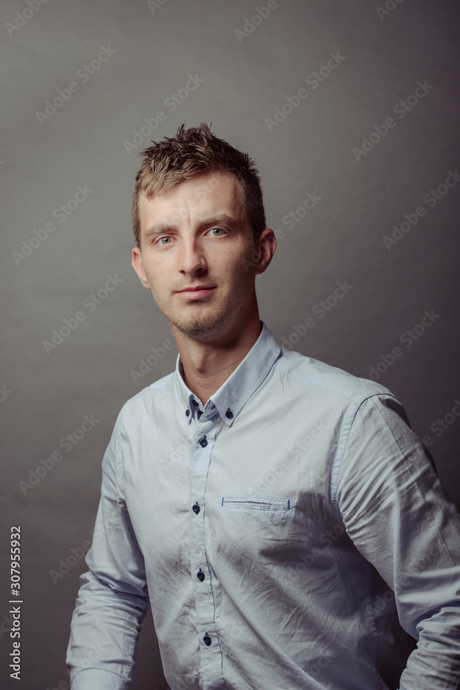 Obraz premium Portrait of a smart serious young man