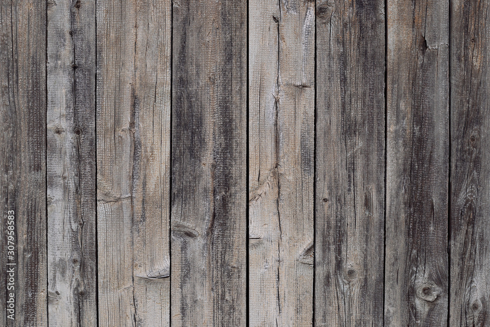 Old grey wood fence texture background. Darck wood planks texture rural wood. Boards wall natural background