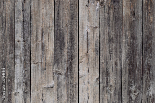 Old grey wood fence texture background. Darck wood planks texture rural wood. Boards wall natural background