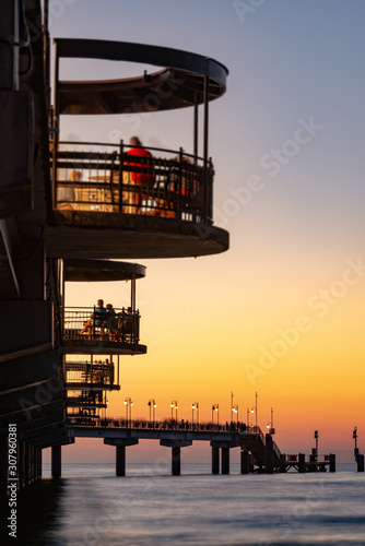 Baltic sea at beautiful sunset in Miedzyzdroje beach. Polish baltic coast. Famous city among the tourist. Pier at sunset © Andrzej Wilusz