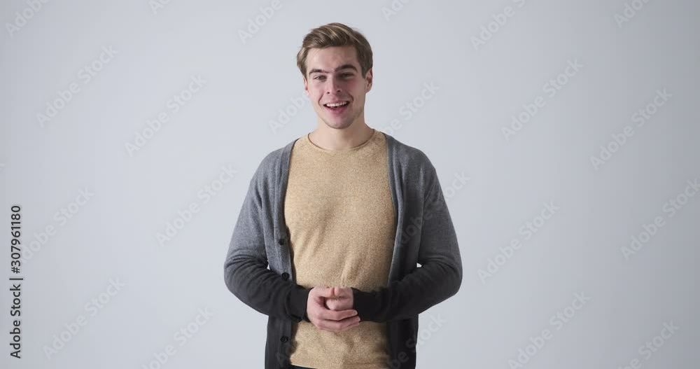 Handsome man vlogger speaking over white background
