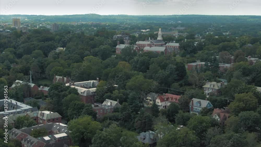 Aerial flying over suburbs, housing & school in New Haven. Next to Yale University Aerial flying over suburbs, housing & school in New Haven. Next to Yale University