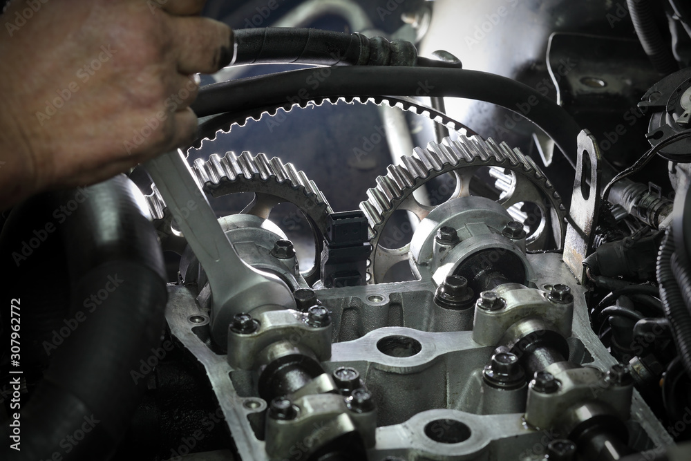 Fototapeta premium Automotive, car servicing, camshaft and cylinder had