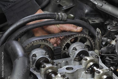 Automotive, car servicing, camshaft and cylinder had