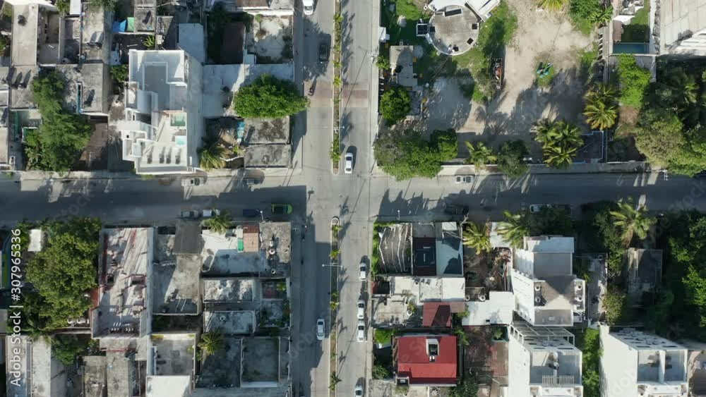 4k aerial Vertical View Following a Street with Traffic in Small Caribbean Town 4k aerial Vertical View Following a Street with Traffic in Small Caribbean Town