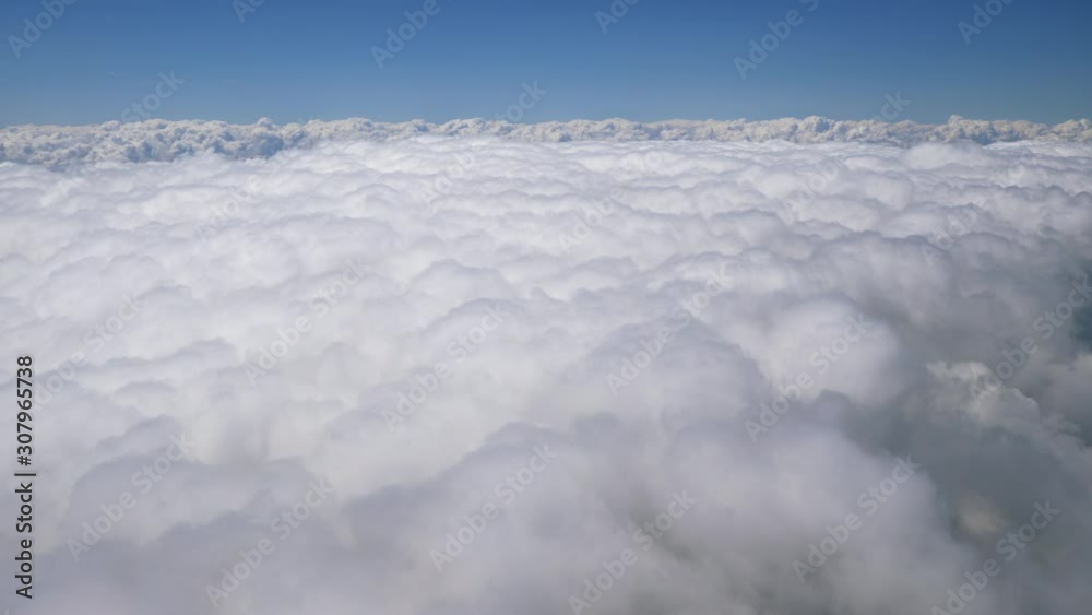 day time aircarft passenger window view white clouds aerial panorama 4k switzerland day time aircarft passenger window view white clouds aerial panorama 4k switzerland