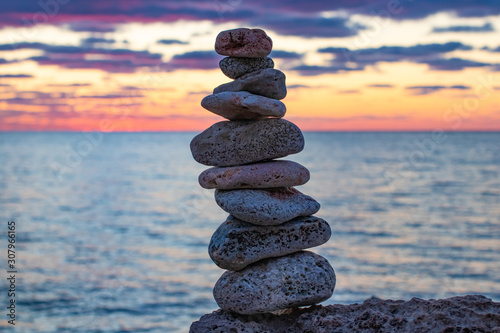 Zen concept. Sunset. The object of the stones on the beach at sunset.  Relax & Meditation. Zen stones.