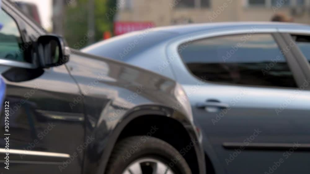 Yuriy Gyumri, Armenia - Cars And Other Vehicles Slowly Moving On The Street While People Crossing - Close-up Shot Yuriy Gyumri, Armenia - Cars And Other Vehicles Slowly Moving On The Street While People Crossing - Close-up Shot
