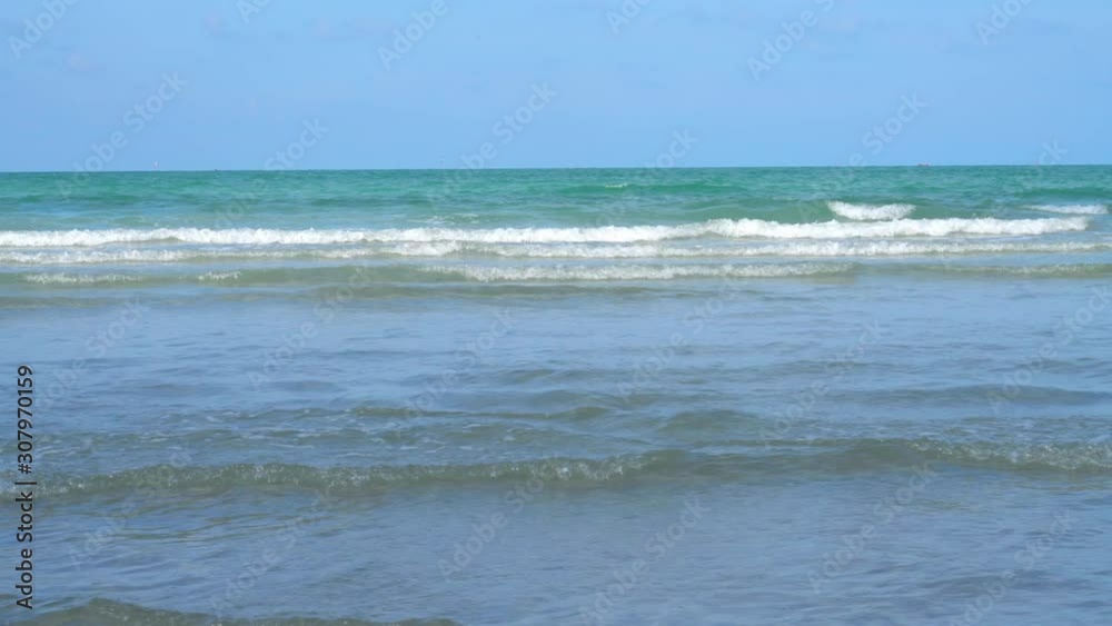 The beach with seascape and white cloud and blue sky background The beach with seascape and white cloud and blue sky background