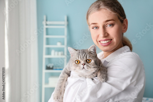 Veterinarian with cute cat ...