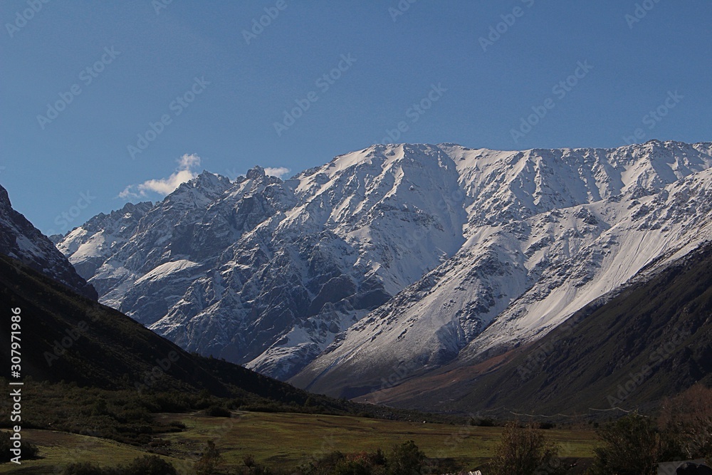 Beautiful mountain landscape in Cajón del Maipo, Chile. Snowy mountain and valley in Chilean central Andes