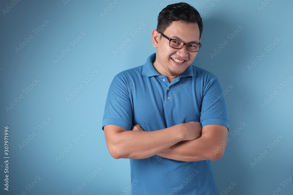 Young Asian Man Smiling Happily Young Asian Man Smiling Happily