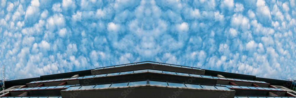 Fototapeta premium Atmospheric sky art panorama. White Altocumulus cloud in blue sky. Australia.