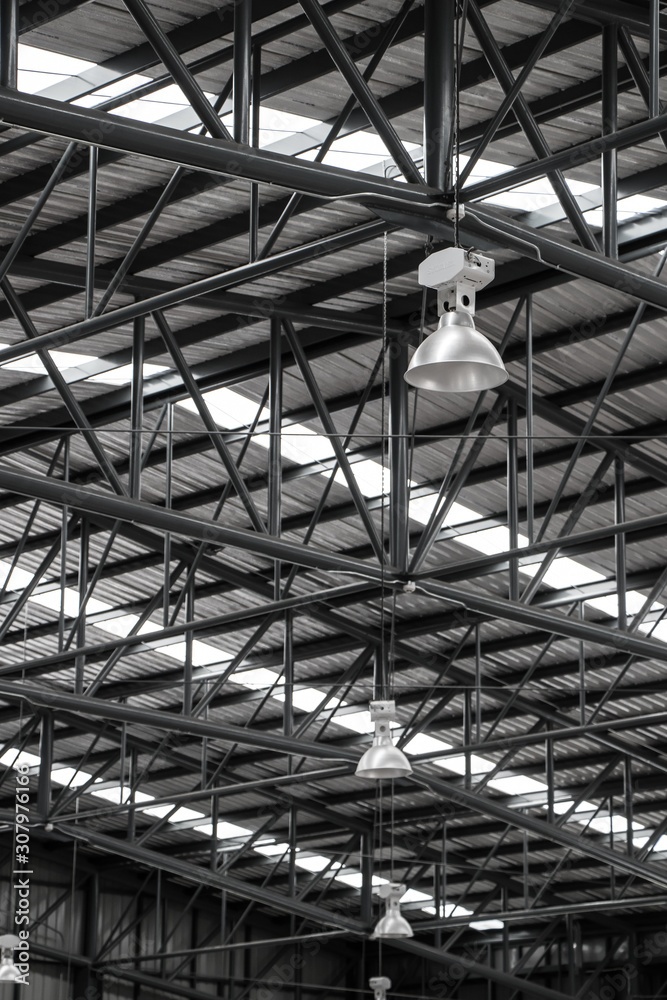 Warehouse metal roofing, Large steel roof structure, bottom view with skylight translucent roof.