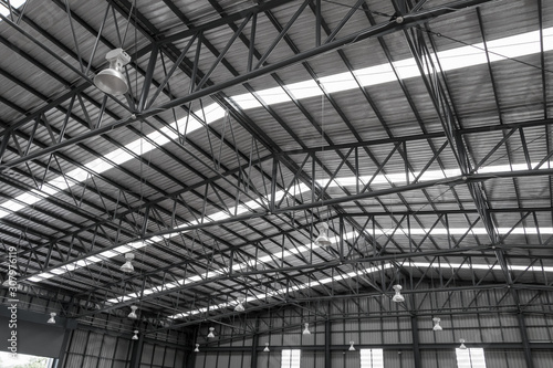 Warehouse metal roofing, Large steel roof structure, bottom view with skylight translucent roof.