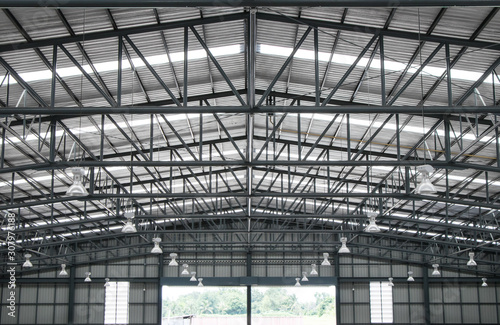 Warehouse metal roofing, Large steel roof structure, bottom view with skylight translucent roof.