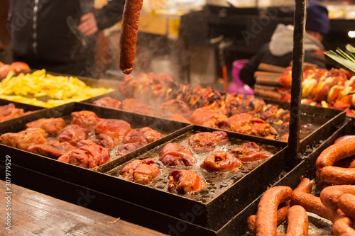 Selling traditional hot food at the Christmas Fair in evening.