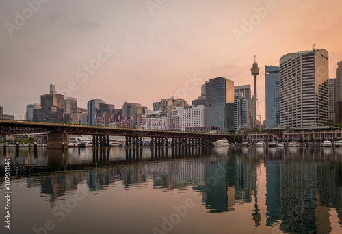 Sydney skyline with pedestrian bridge in the morning